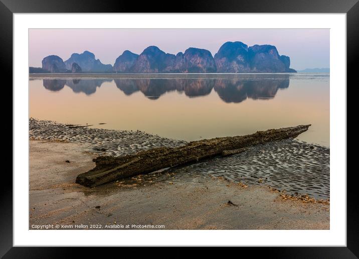 Driftwood on the beach at dawn,  Framed Mounted Print by Kevin Hellon