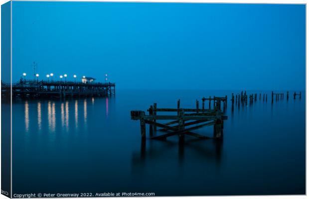 The Remains Of The Old Pier At Swanage, Dorset At Night Canvas Print by Peter Greenway