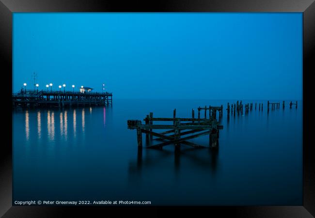 The Remains Of The Old Pier At Swanage, Dorset At Night Framed Print by Peter Greenway