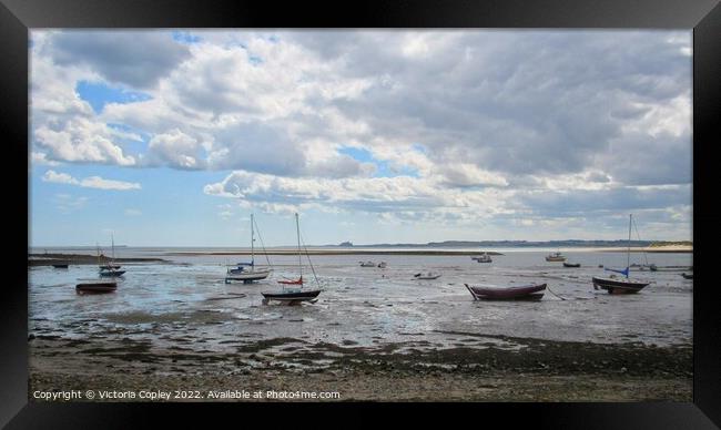 Boats of Lindisfarne Framed Print by Victoria Copley