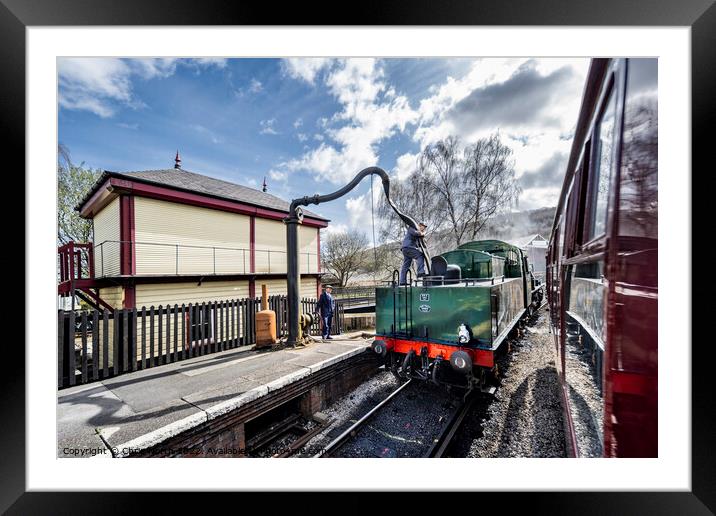 Taking on water at Keighley station. Framed Mounted Print by Chris North