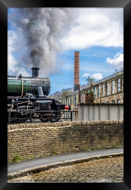 Steam engine departing Keighley station. Framed Print by Chris North