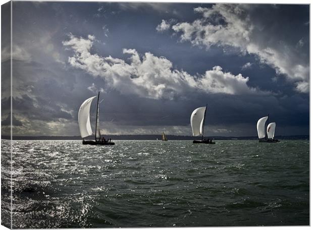 Yachts racing into the light Canvas Print by Gary Eason
