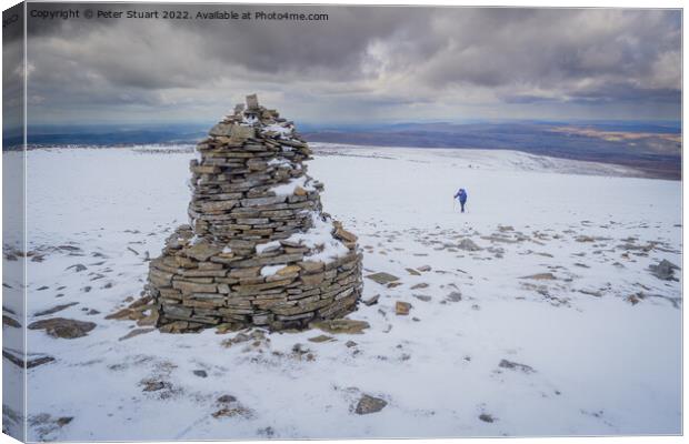 An ascent of Cross Fell on a cold snowy day in April Canvas Print by Peter Stuart