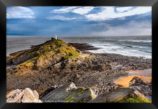 Majestic Mumbles Lighthouse Framed Print by Peter Thomas