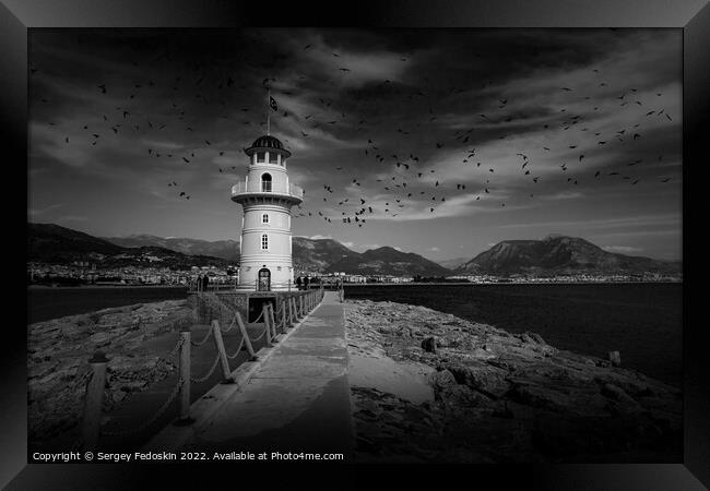 Old lighthouse in the port. Framed Print by Sergey Fedoskin