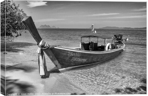 Long tailed boat on tropical island, Koh Naka, Phuket, Thailand Canvas Print by Kevin Hellon
