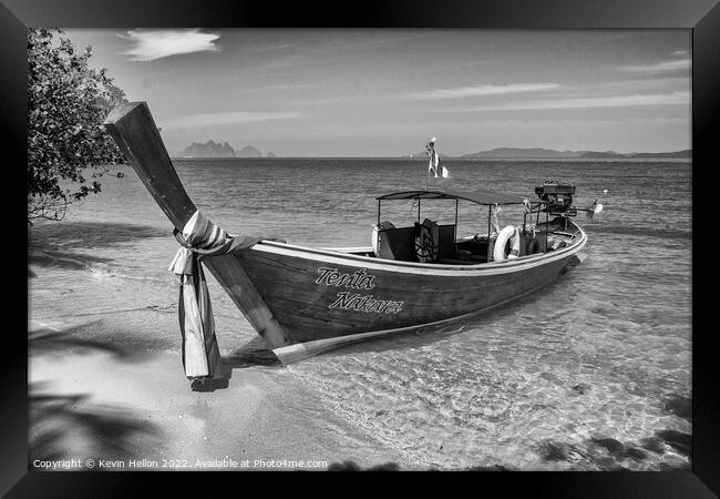 Long tailed boat on tropical island, Koh Naka, Phuket, Thailand Framed Print by Kevin Hellon