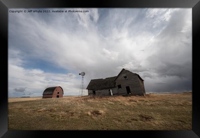 Abandoned farm buildings in Alberta Framed Print by Jeff Whyte