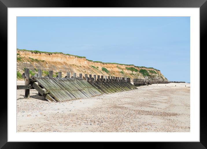 Happisburgh revetments on the beach Framed Mounted Print by Jason Wells