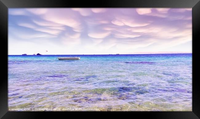 Red sea with waves on sky Framed Print by M. J. Photography