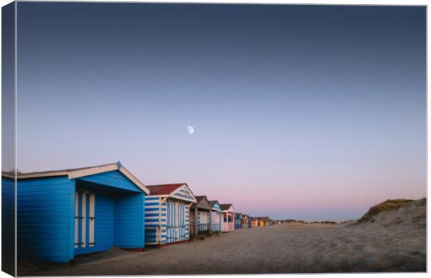 Beach Huts Sunset, West Wittering Canvas Print by Mark Jones