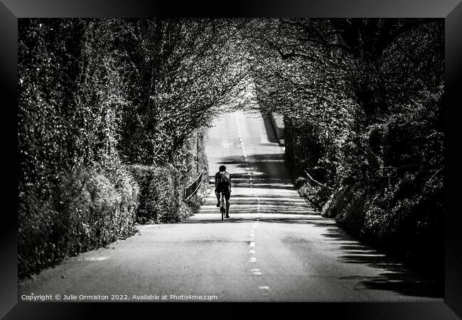 The Lone Cyclist Framed Print by Julie Ormiston