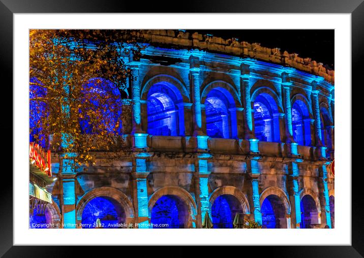 Ancient Roman Amphitheatre Night Illuminated Nimes Gard France Framed Mounted Print by William Perry