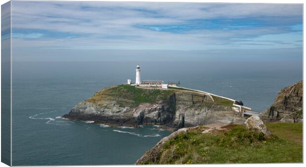 Majestic South Stack Lighthouse Canvas Print by Alan Tunnicliffe
