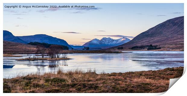An Teallach viewed across frozen Loch Droma Print by Angus McComiskey