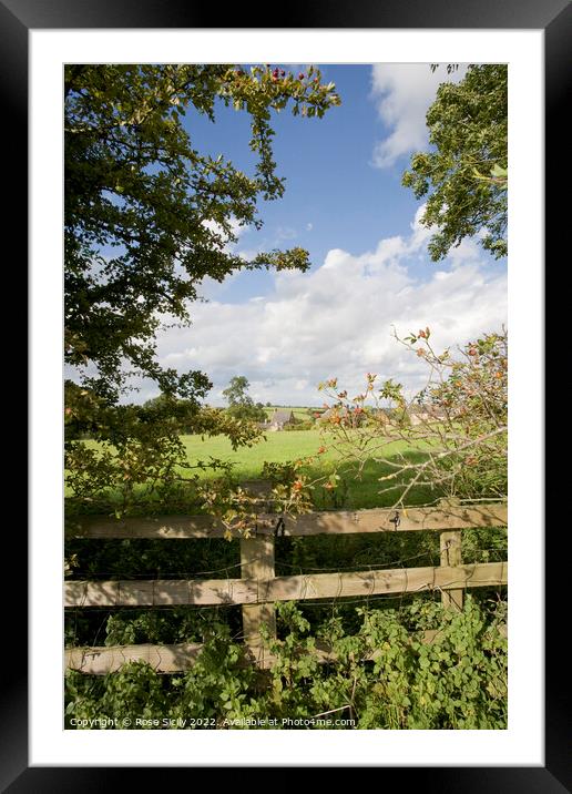 Looking over fence towards Oxfordshire village Framed Mounted Print by Rose Sicily