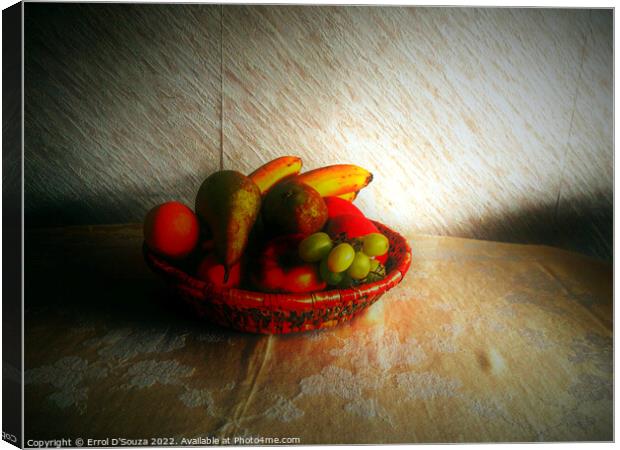 Still life of mixed fruit in a basket Canvas Print by Errol D'Souza