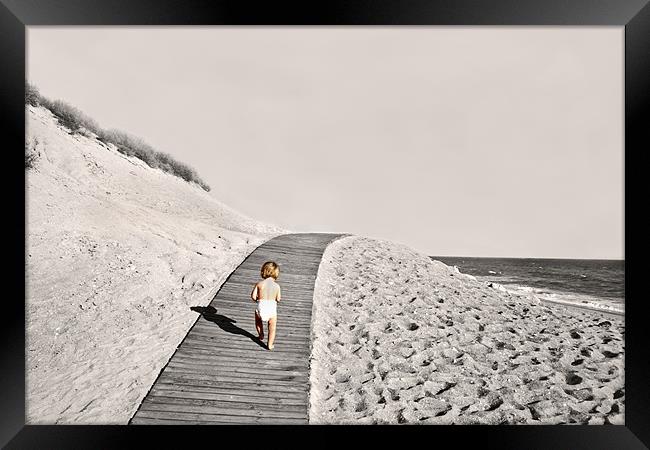 Baby running across beach edge Framed Print by Tanya Hodgkiss
