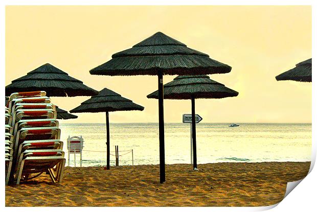 Sun set umbrellas on the beach in Portgual Print by Tanya Hodgkiss