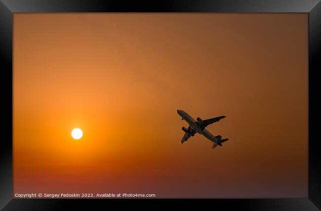 Passenger plane in the beautiful sky - Air travel Framed Print by Sergey Fedoskin