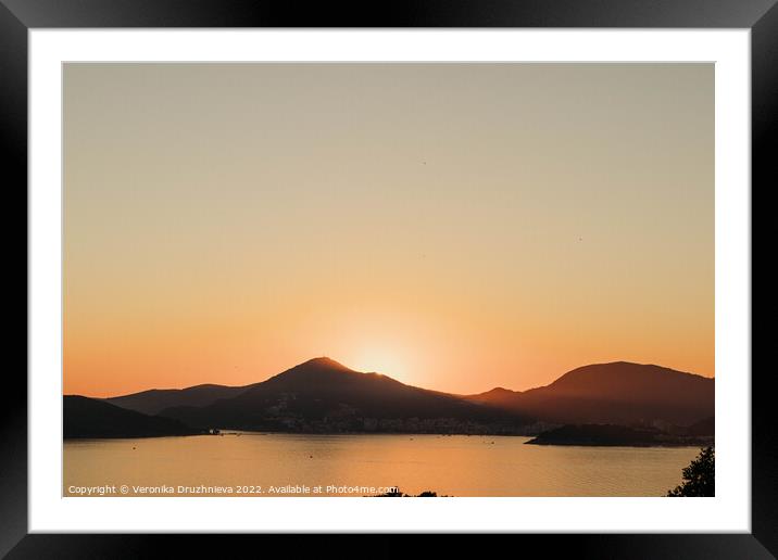A sunset over a body of water, Montenegro  Framed Mounted Print by Veronika Druzhnieva