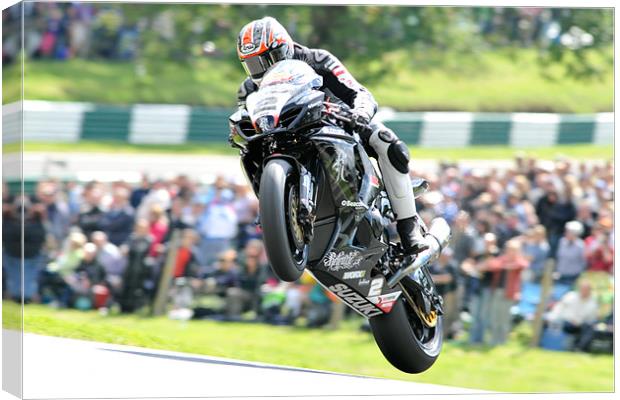 Josh Brookes - Take Off at Cadwell park 2011 Canvas Print by SEAN RAMSELL