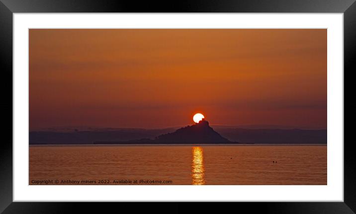 Sun rising over St.Michaels Mount Cornwall. Framed Mounted Print by Anthony miners