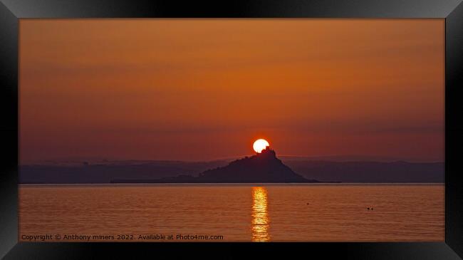 Sun rising over St.Michaels Mount Cornwall. Framed Print by Anthony miners