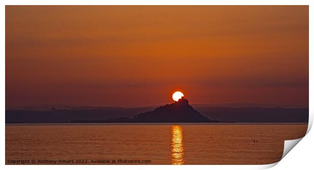 Sun rising over St.Michaels Mount Cornwall. Print by Anthony miners