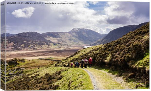 Walkers Hiking Outdoors into Cwm Eigiau Snowdonia  Canvas Print by Pearl Bucknall