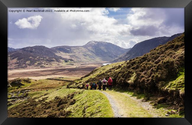 Walkers Hiking Outdoors into Cwm Eigiau Snowdonia  Framed Print by Pearl Bucknall