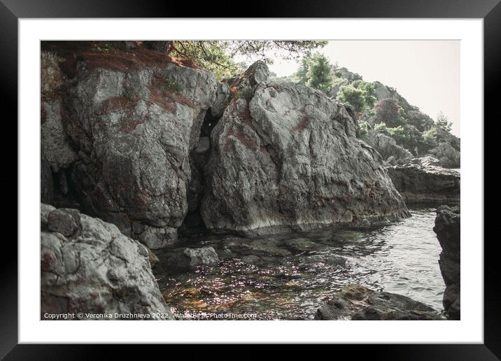 Outdoor stonerock ant the sea.  Framed Mounted Print by Veronika Druzhnieva