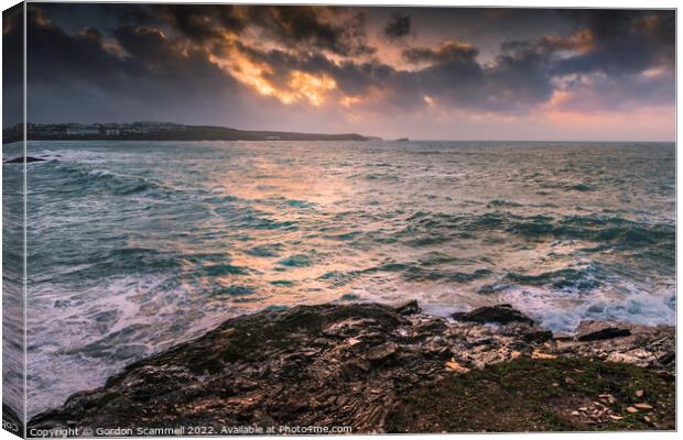 Dramatic evening sunlight over Fistral Bay in Newq Canvas Print by Gordon Scammell