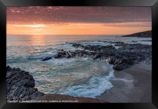 A spectacular sunset over Fistral Bay on the coast Framed Print by Gordon Scammell