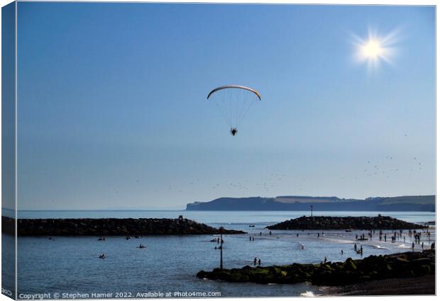 Powered Paraglider over Sidmouth Canvas Print by Stephen Hamer