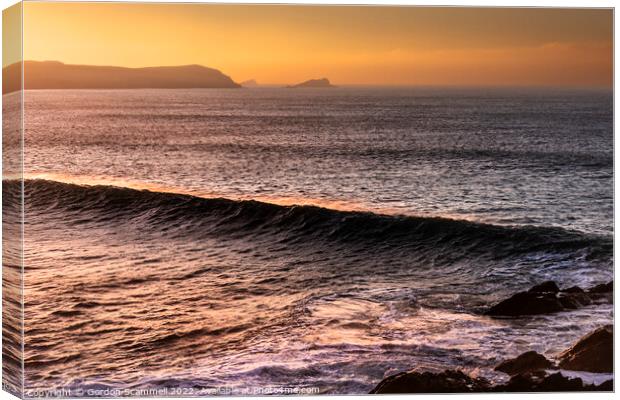 An intense golden sunset over Fistral Bay in Newqu Canvas Print by Gordon Scammell