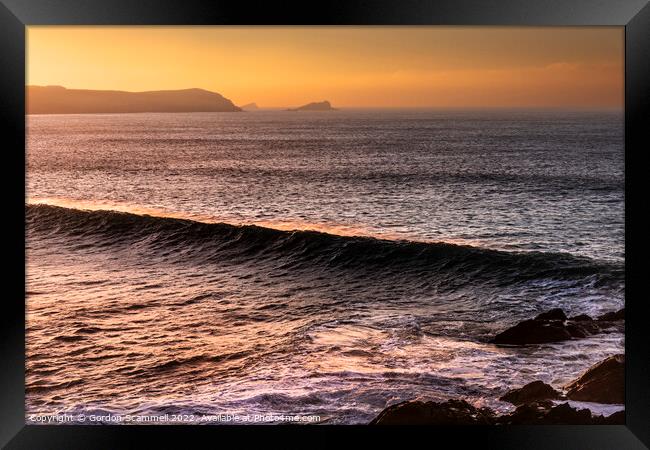 An intense golden sunset over Fistral Bay in Newqu Framed Print by Gordon Scammell