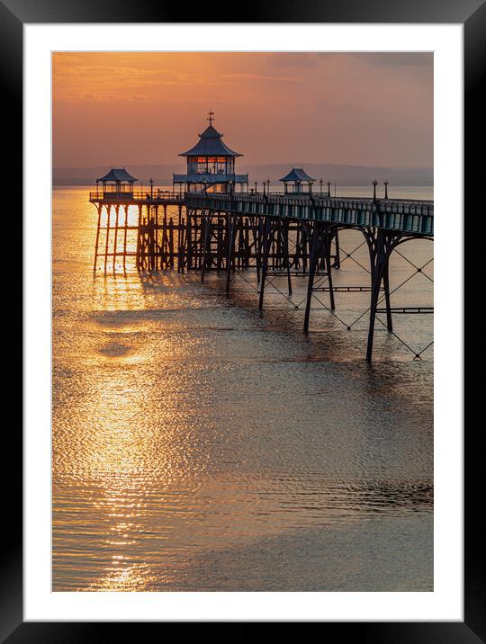 Clevedon Pier with a golden reflection on the sea Framed Mounted Print by Rory Hailes