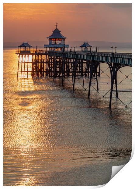 Clevedon Pier with a golden reflection on the sea Print by Rory Hailes