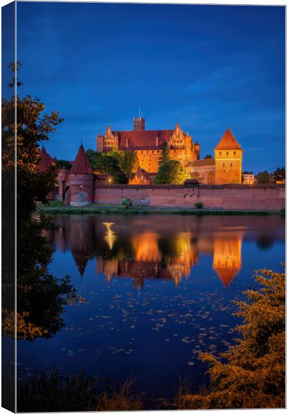 Malbork Castle by Night in Poland Canvas Print by Artur Bogacki