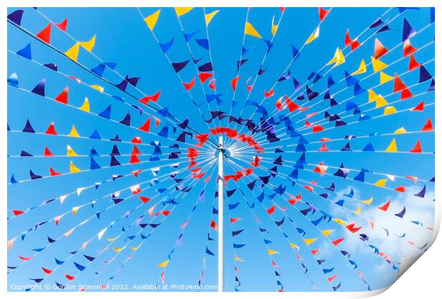 Colourful bunting against a blue sky. Print by Gordon Scammell