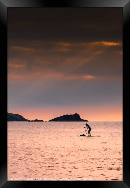 Evening light over a Stand Up Paddleboarder at Fis Framed Print by Gordon Scammell