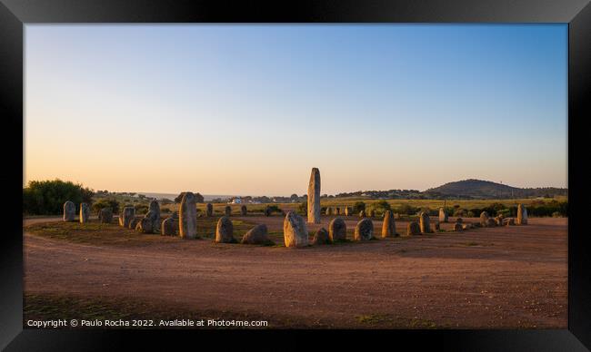 Stone menhirs at Cromeleque do Xerez in Portugal at sunrise Framed Print by Paulo Rocha