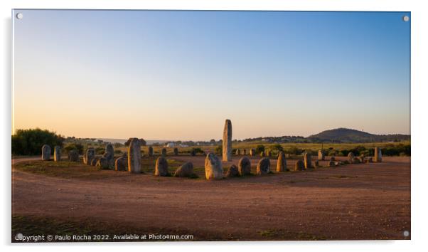 Stone menhirs at Cromeleque do Xerez in Portugal at sunrise Acrylic by Paulo Rocha