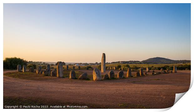 Stone menhirs at Cromeleque do Xerez in Portugal at sunrise Print by Paulo Rocha