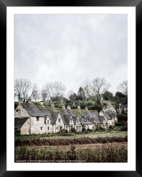A View Of A Row of Historic Quintessential Cotswold Cottages In Bibury Framed Mounted Print by Peter Greenway
