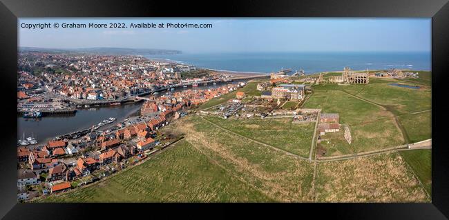 Whitby town harbour and Abbey headland Framed Print by Graham Moore