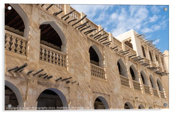 Middle eastern architecture with bamboo wooden poles sticking out of a building Acrylic by SnapT Photography