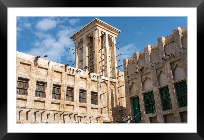 Tower in Souq Waqif with traditional middle eastern qatari architecture Framed Mounted Print by SnapT Photography